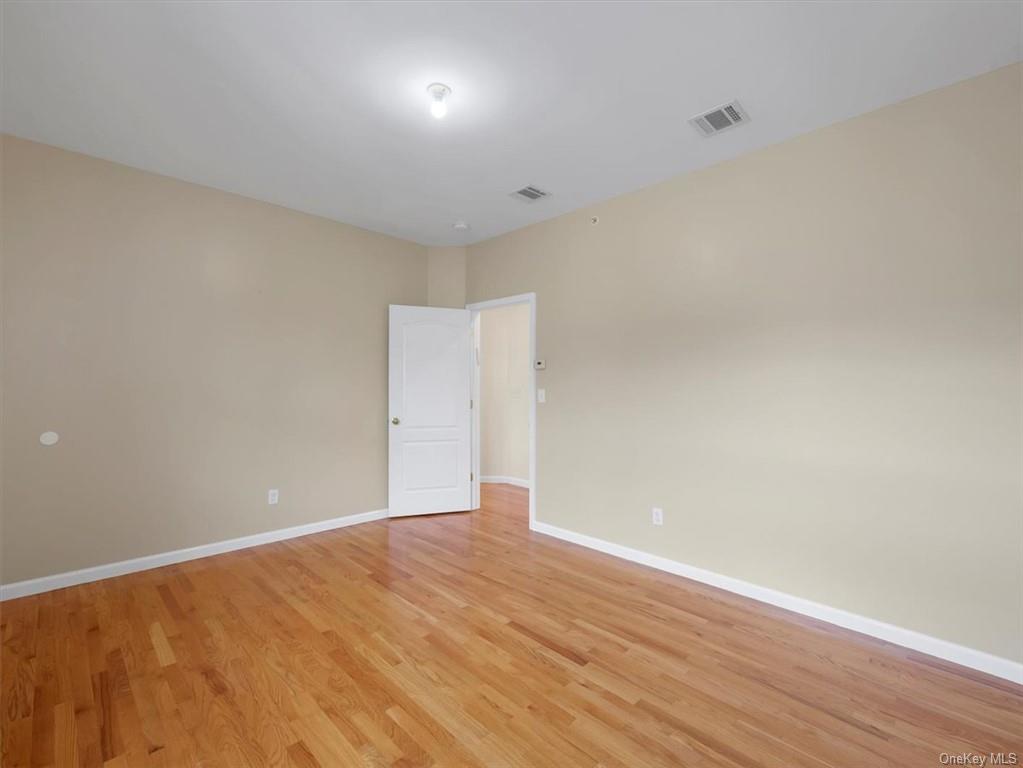 480 West Central Avenue Spring Valley, NY 10977 - Photo 19 of 35 a view of an empty room with wooden floor