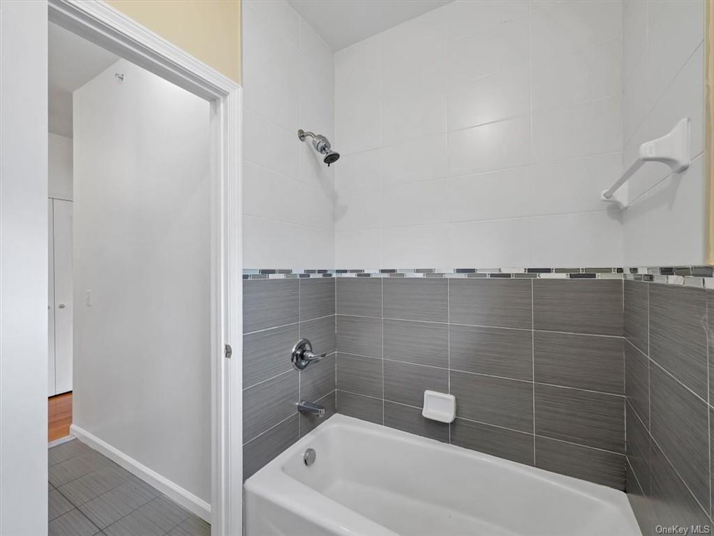 480 West Central Avenue Spring Valley, NY 10977 - Photo 23 of 35 a bathroom with a shower and a bathtub