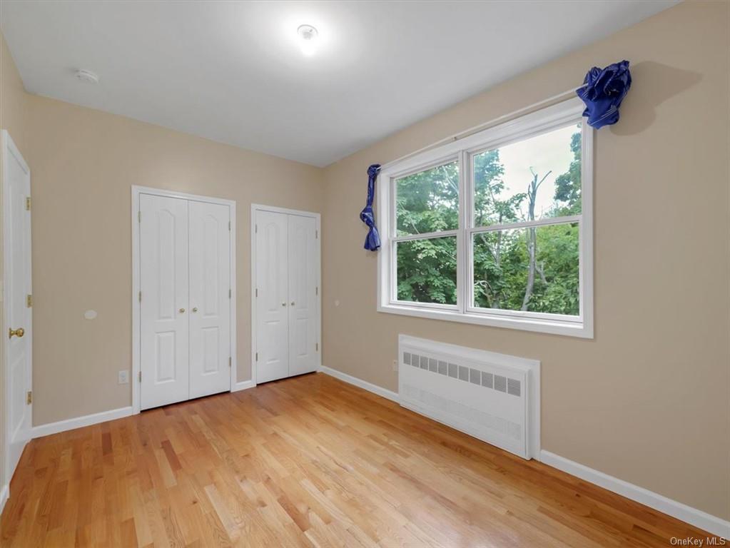 480 West Central Avenue Spring Valley, NY 10977 - Photo 27 of 35 a view of a room with wooden floor and windows