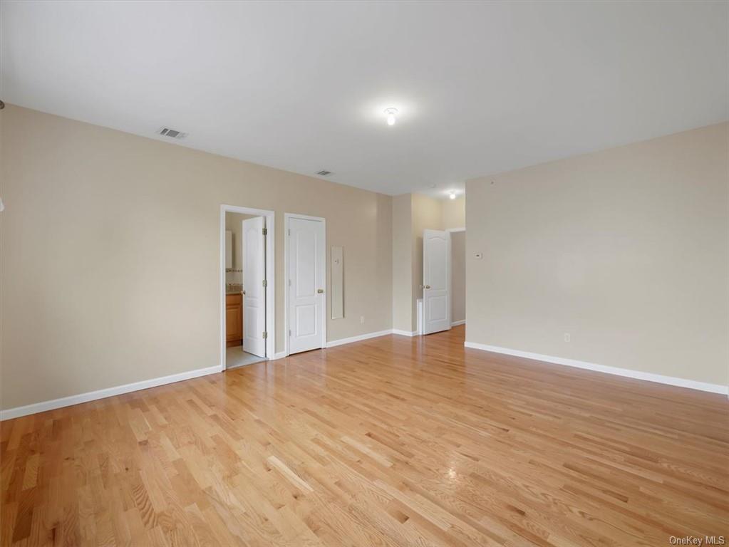 480 West Central Avenue Spring Valley, NY 10977 - Photo 28 of 35 a view of an empty room with wooden floor