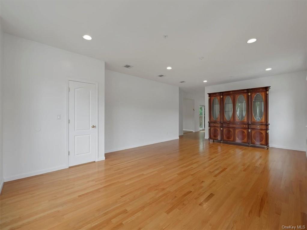 480 West Central Avenue Spring Valley, NY 10977 - Photo 3 of 35 a view of an empty room with wooden floor