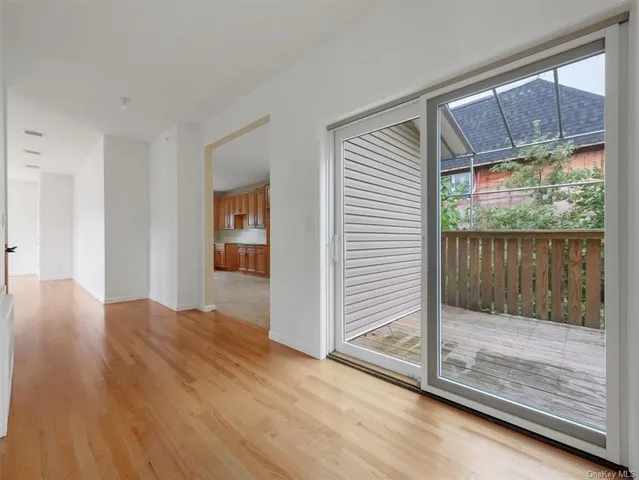 a view of entryway with wooden floor