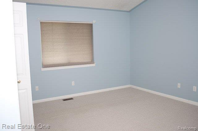 10404 Fawn Ridge Trail, Unit 2 Hartland, MI 48353 - Photo 8 of 13 Bedroom EL