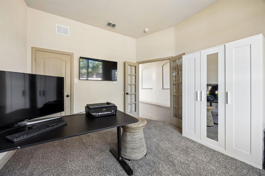 1341 Canary Lane Forney, TX 75126 - Photo 27 of 34 5th bedroom downstairs currently used as an office.