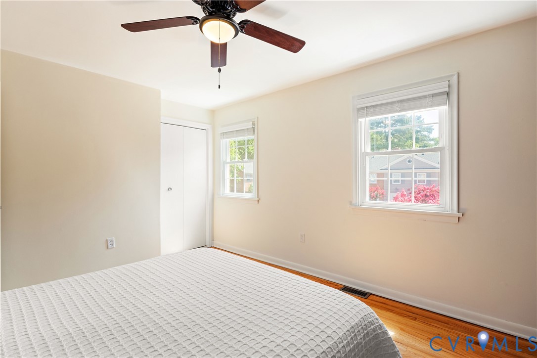 9129 Derbyshire Road, Unit E Henrico, VA 23229 - Photo 22 of 36 Bright interior space featuring wood-finish floori