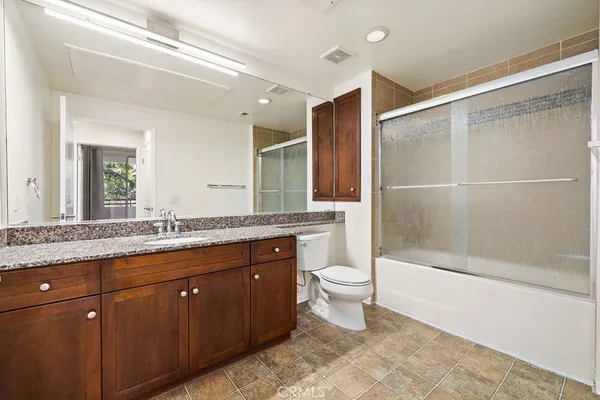 a view of empty room with floor to ceiling window