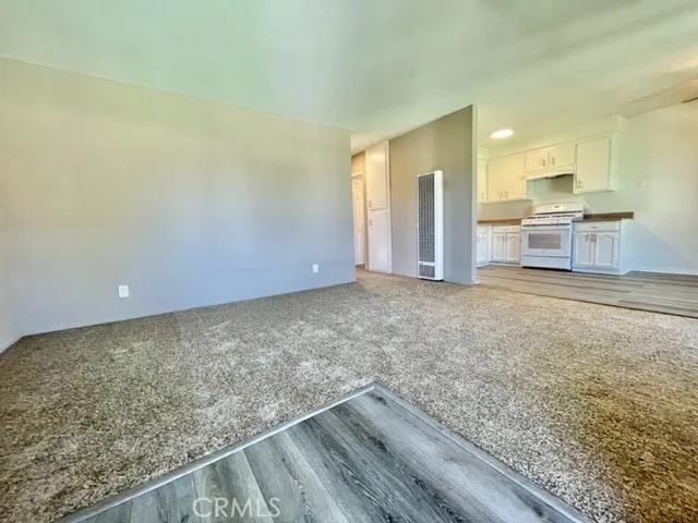 a view of kitchen with wooden floor