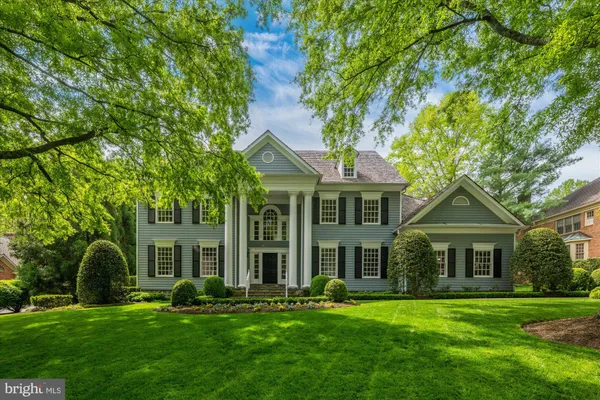 front view of a house with a garden