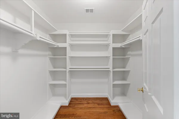 a view of a room with shelf on the door