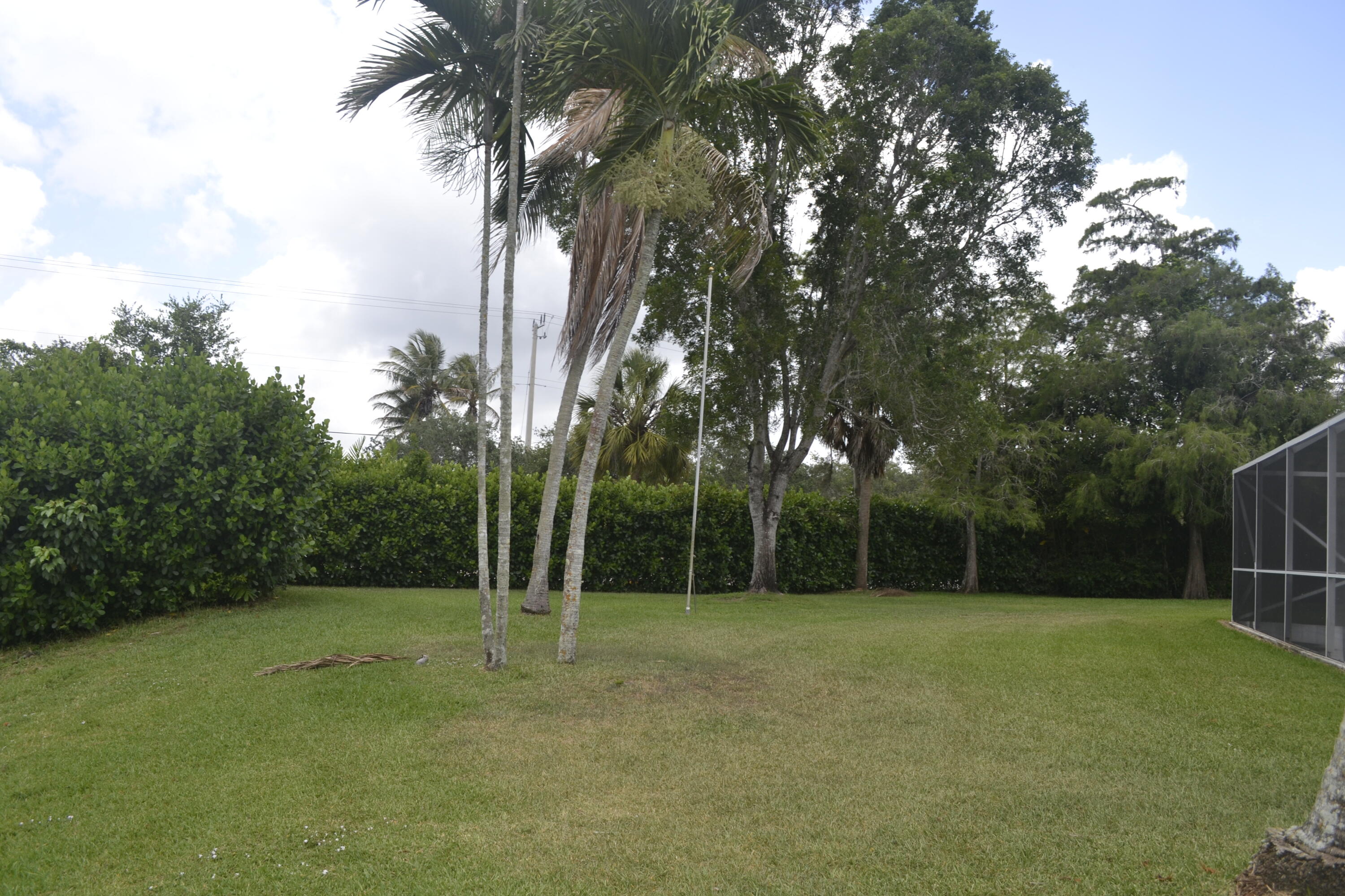 1104 Raintree Lane Wellington, FL 33414 - Photo 23 of 30 Back yard .39