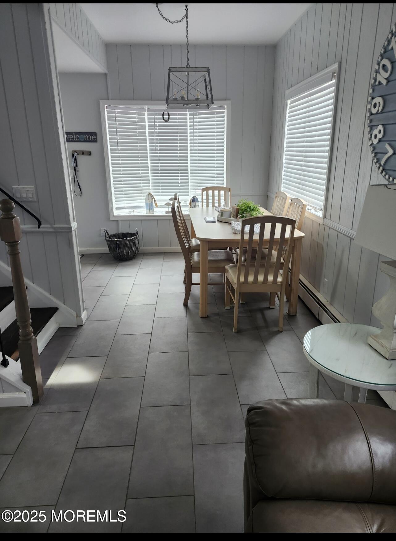 23 Surf Way Lavallette, NJ 08735 - Photo 11 of 26 a dining room with furniture and wooden floor