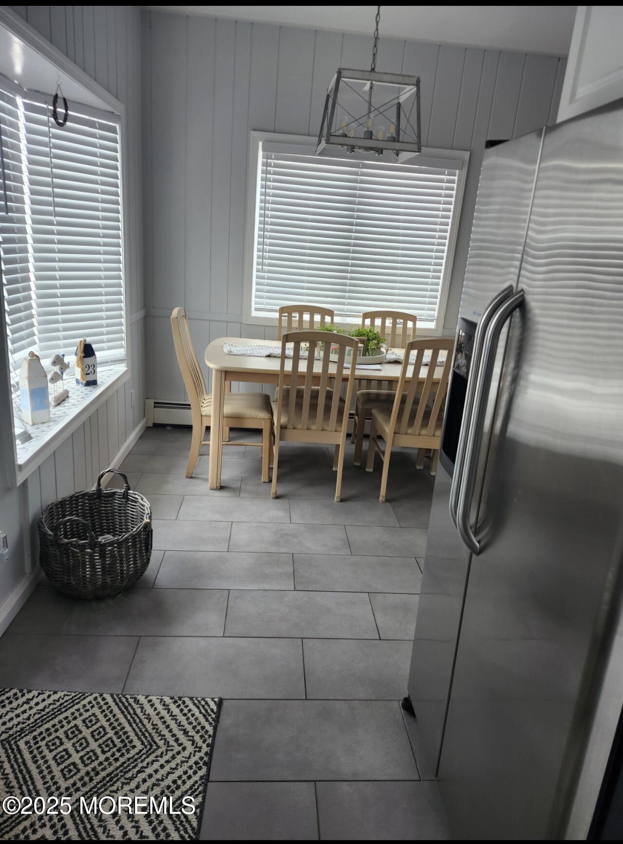 23 Surf Way Lavallette, NJ 08735 - Photo 7 of 26 a dining room with furniture and a window