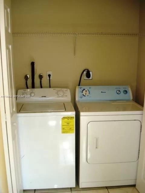 2540 Northeast 41st Terrace Homestead, FL 33033 - Photo 9 of 12 a utility room with dryer and washer