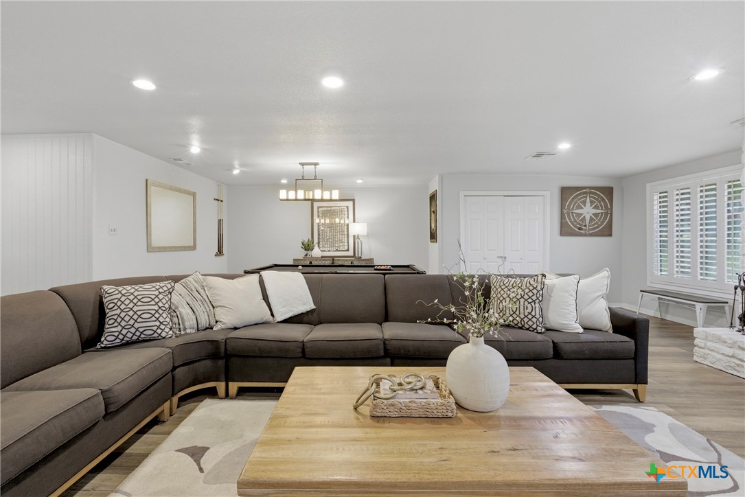 1710 Old Mill Road, Unit 12 Salado, TX 76571 - Photo 1 of 42 a living room with furniture and a couch