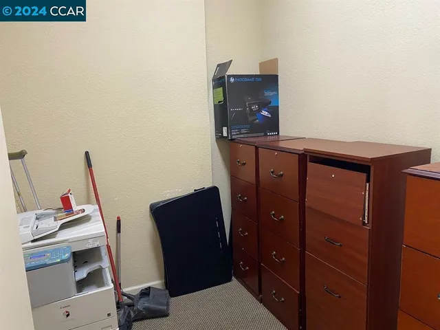 a view of a hallway with workspace