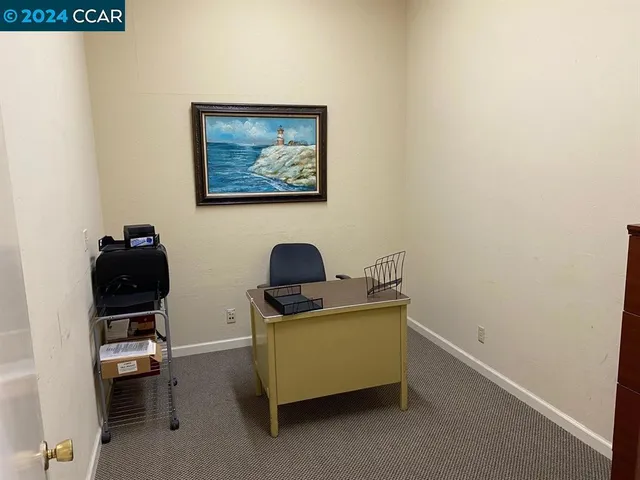 a view of workspace with a couch