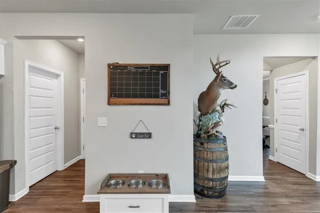 a view of a hallway with staircase