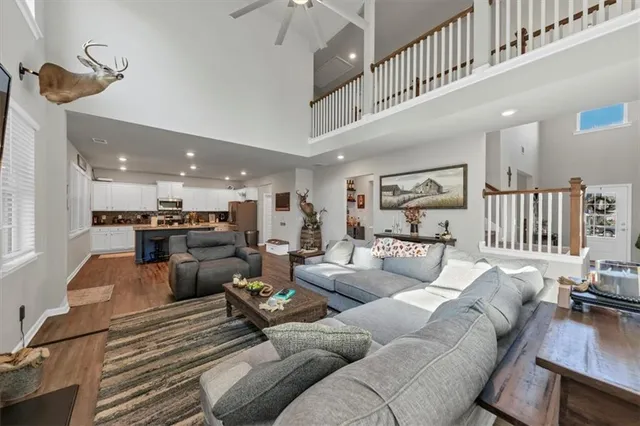 a living room with furniture and a table