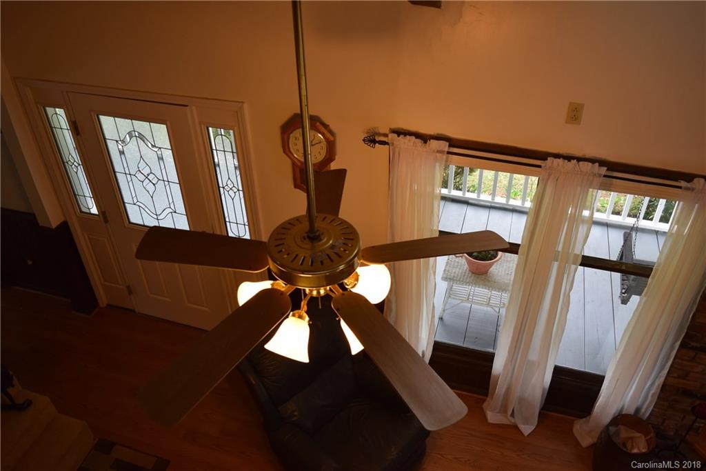 301 Weeks Road Rutherfordton, NC 28139 - Photo 12 of 16 a view of entryway and hall with a chandelier