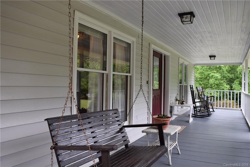 301 Weeks Road Rutherfordton, NC 28139 - Photo 13 of 16 a view of balcony with two chairs and wooden floor