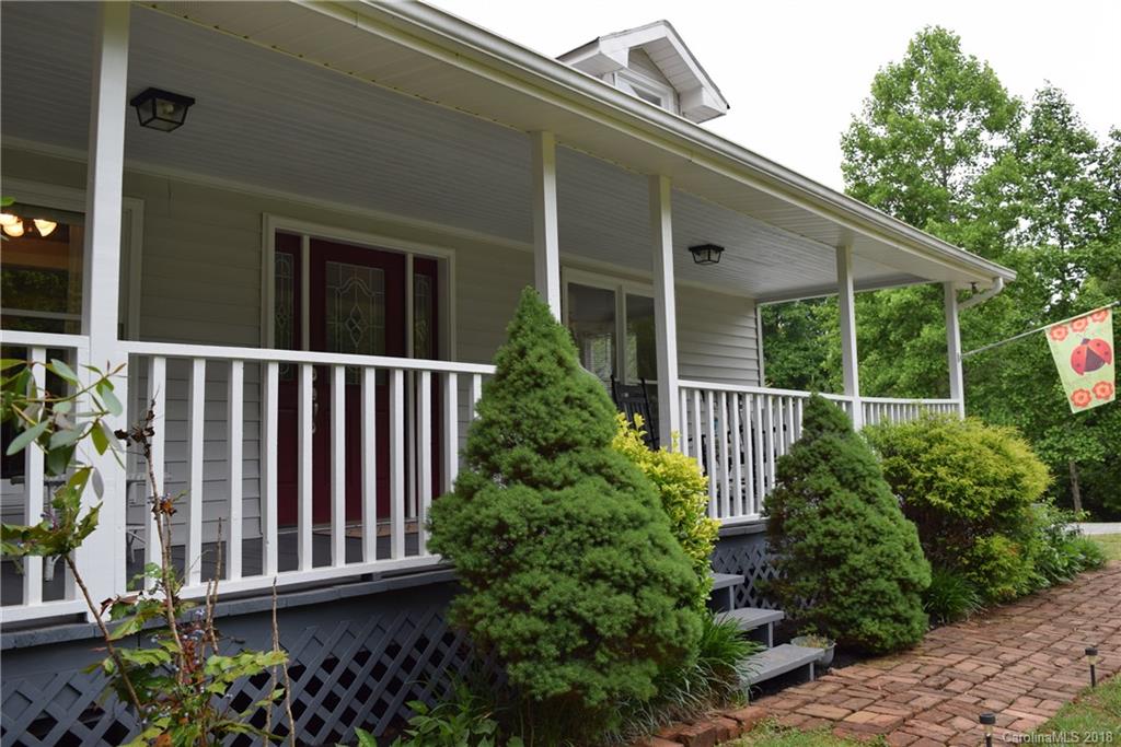 301 Weeks Road Rutherfordton, NC 28139 - Photo 16 of 16 a view of a house with a small yard and plants