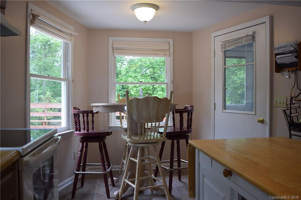 301 Weeks Road Rutherfordton, NC 28139 - Photo 3 of 16 a view of a dining room with furniture window and outside view