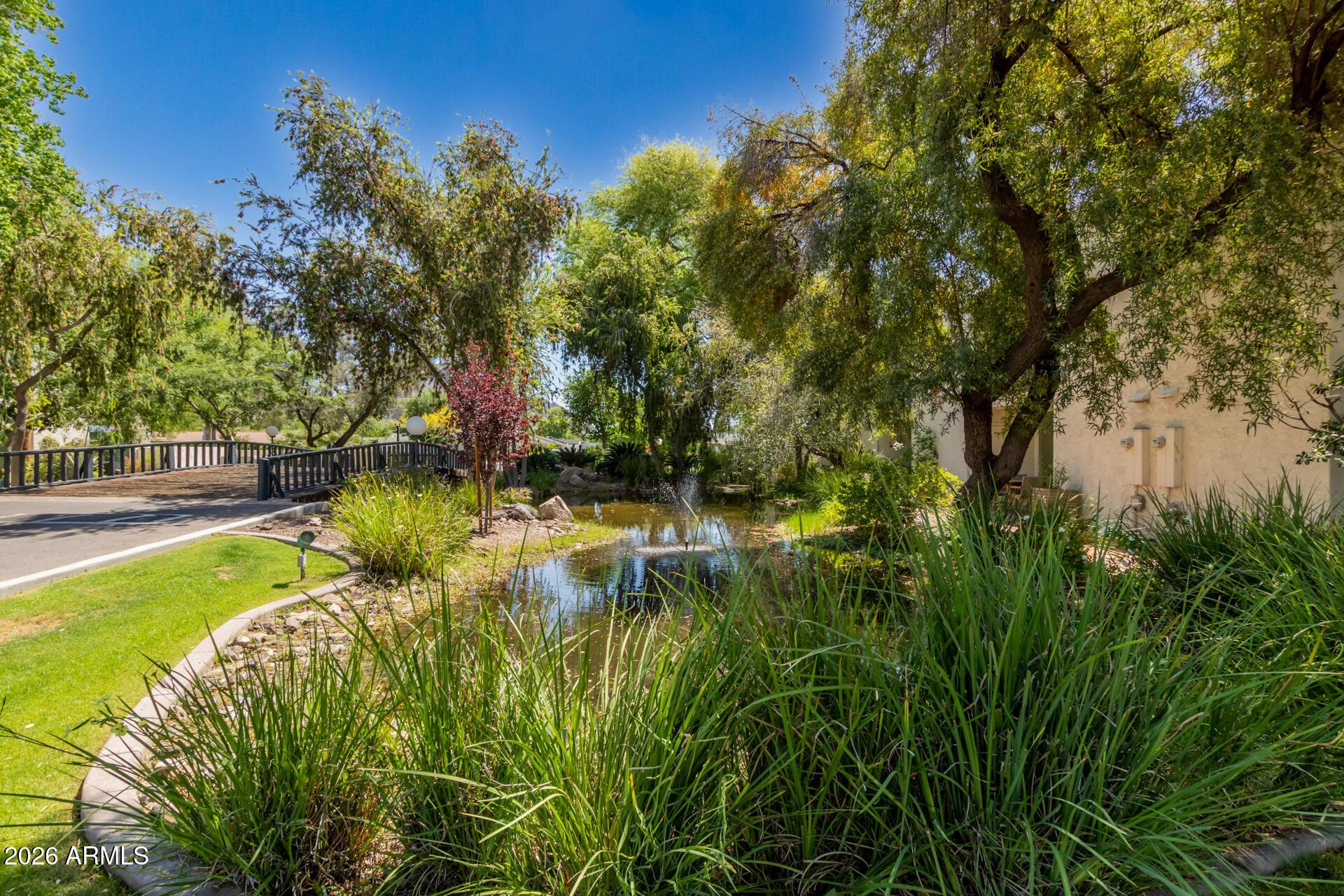4656 North 40th Street Phoenix, AZ 85018 - Photo 25 of 28 a view of swimming pool with a yard