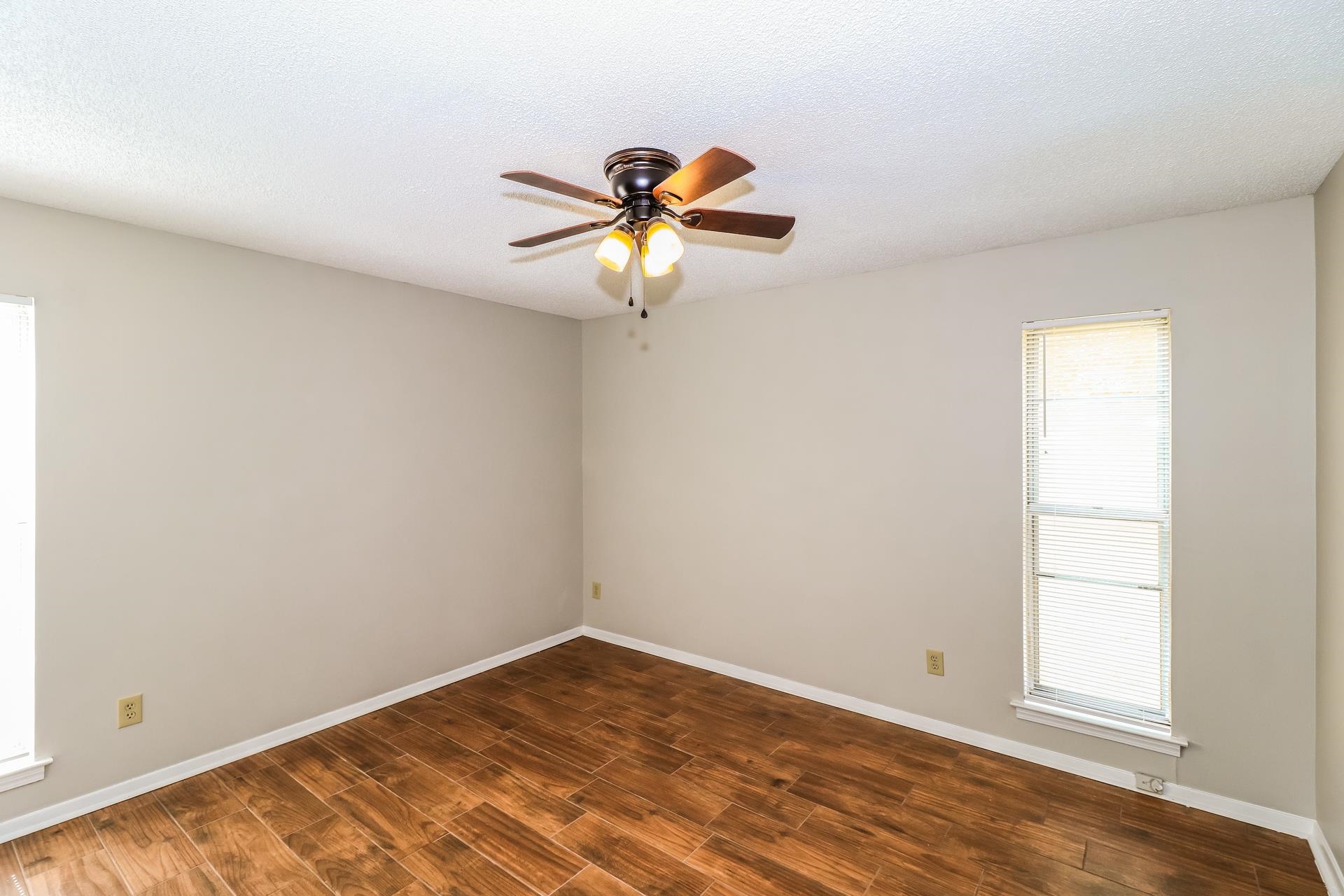 2145 Bobolink Trail Memphis, TN 38134 - Photo 8 of 16 a view of an empty room with a window
