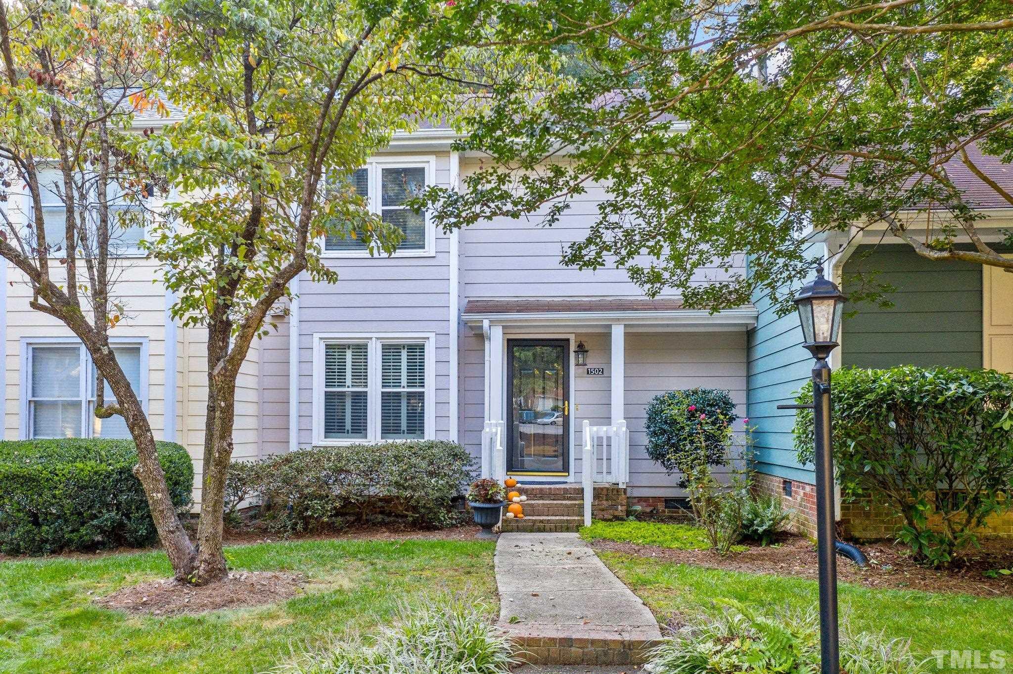 Welcome to 1502 Edgeside Court in North Ridge Villas Homes. Close to dining and shopping in North Hills and along Falls of Neuse Road.