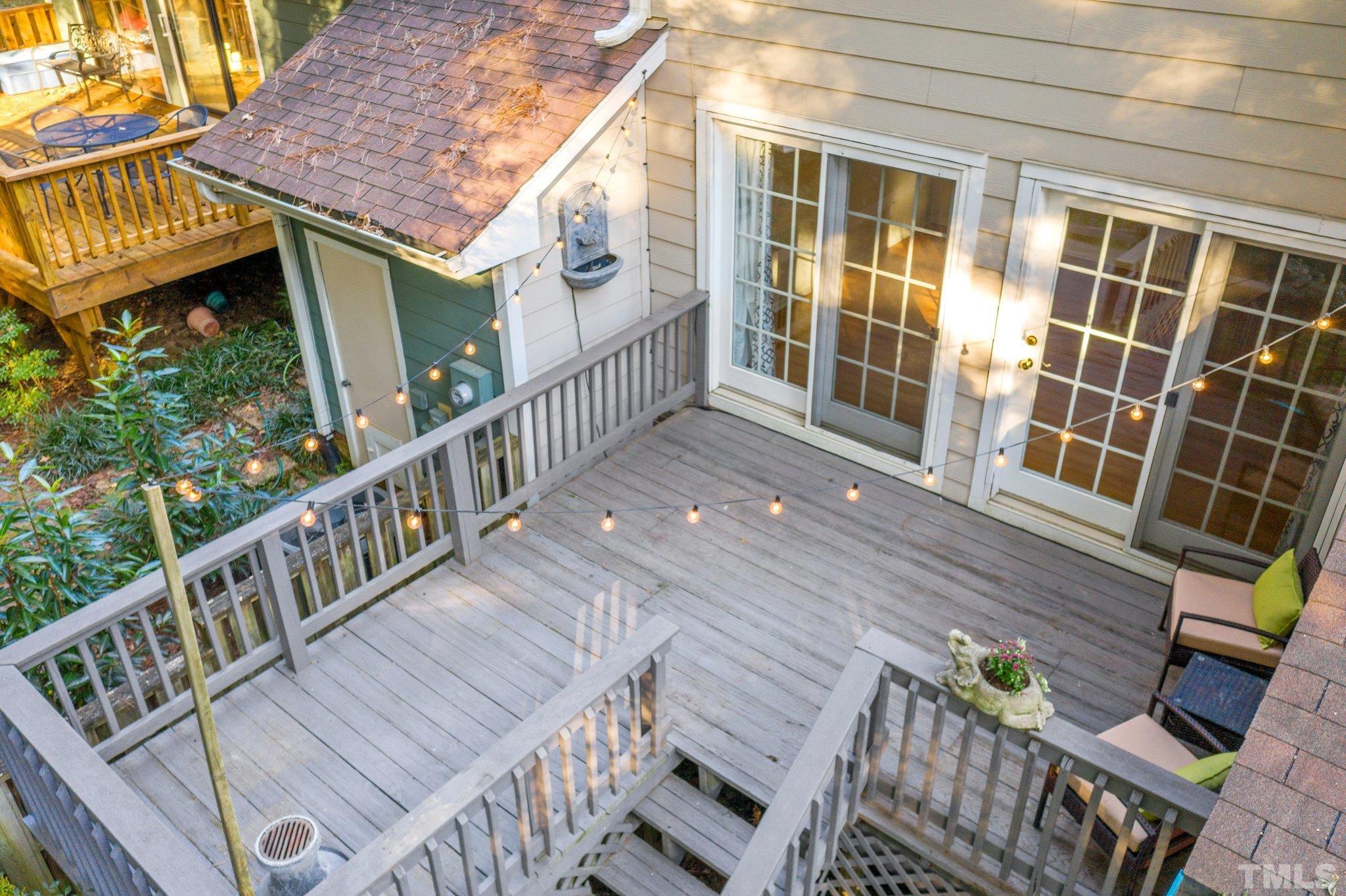 1502 Edgeside Court Raleigh, NC 27609 - Photo 20 of 27 Down the steps is a storage area attached to the house.