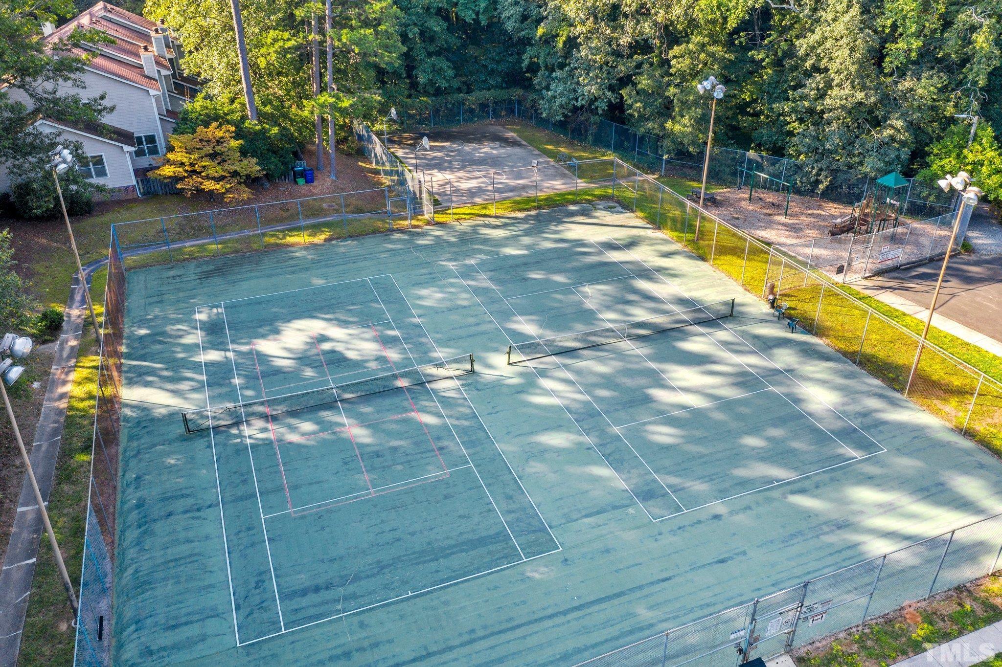 1502 Edgeside Court Raleigh, NC 27609 - Photo 26 of 27 Community Tennis Court and Playground