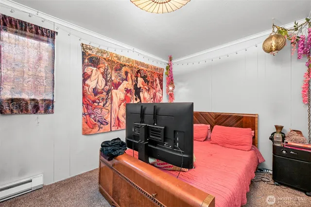 a bathroom with a toilet and a sink