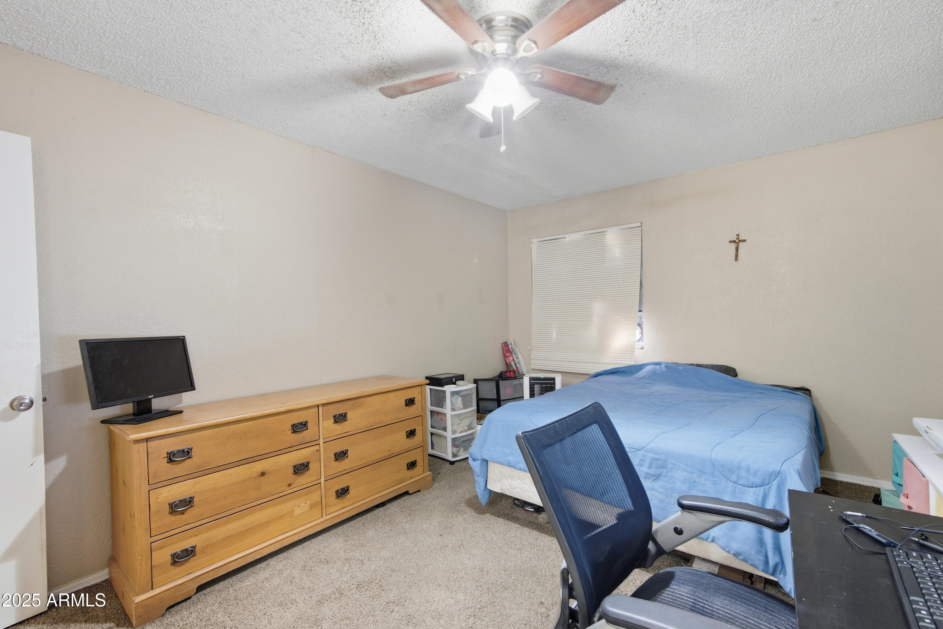 4242 North 69th Lane, Unit 1333 Phoenix, AZ 85033 - Photo 14 of 18 a view of a workspace with furniture