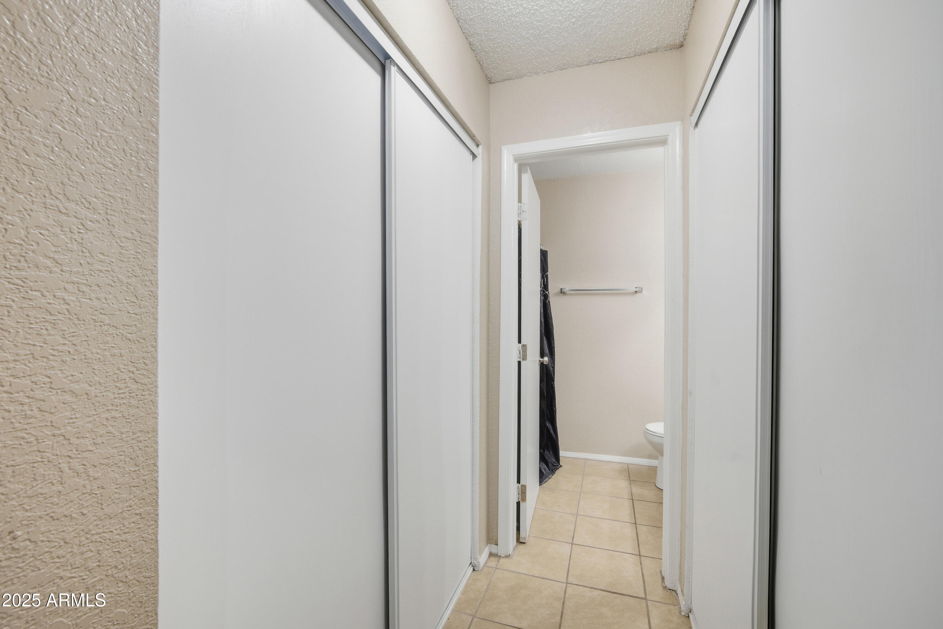 4242 North 69th Lane, Unit 1333 Phoenix, AZ 85033 - Photo 15 of 18 a view of a hallway