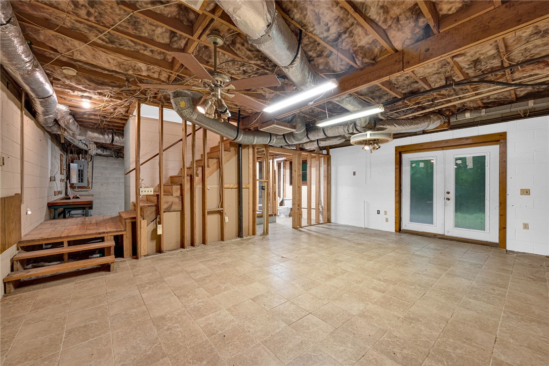237 Spring Valley Road Liberty, SC 29657 - Photo 21 of 50 Unfinished basement with exposed wood framing, ductwork, and electrical provides ample space for future customization.
