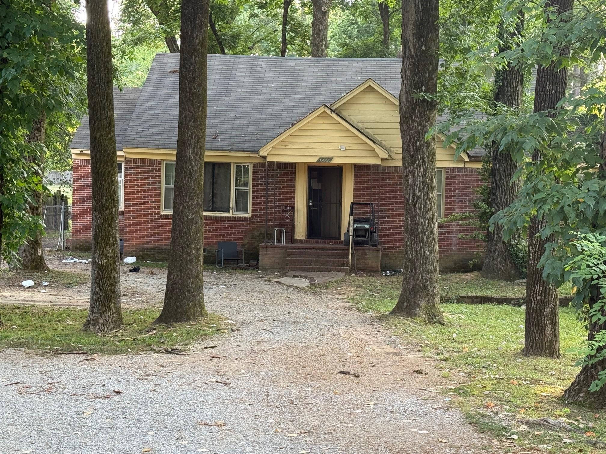 a backyard of a house with seating space
