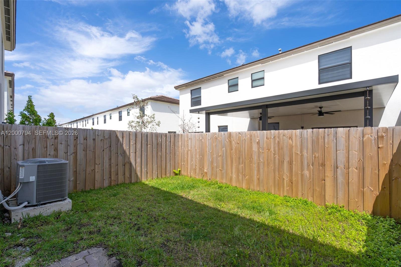 23077 Southwest 129th Place Miami, FL 33177 - Photo 18 of 43 a backyard of a house with lots of green space