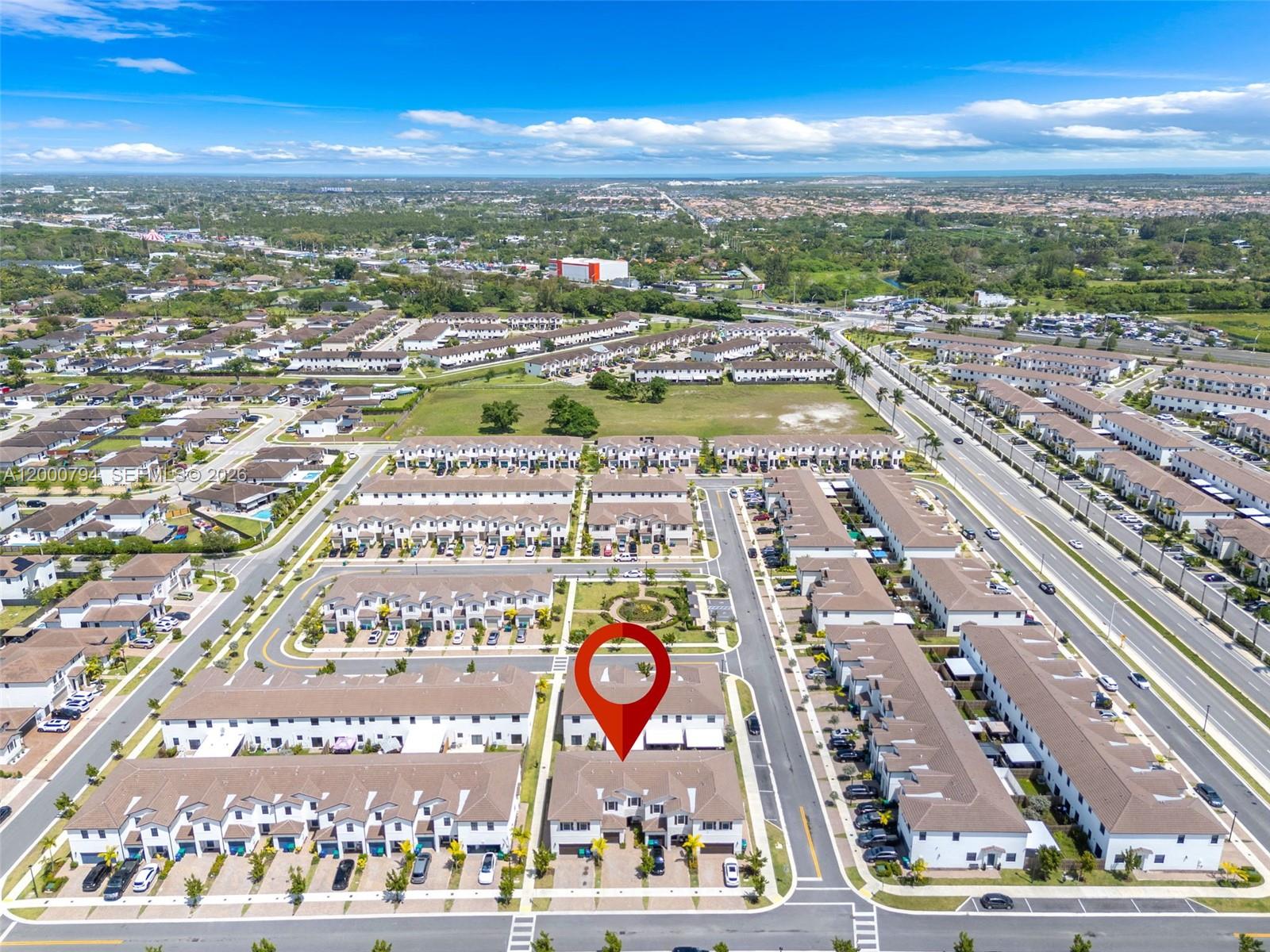 23077 Southwest 129th Place Miami, FL 33177 - Photo 2 of 43 an aerial view of residential building with an outdoor space