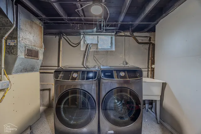 a utility room with dryer and washer