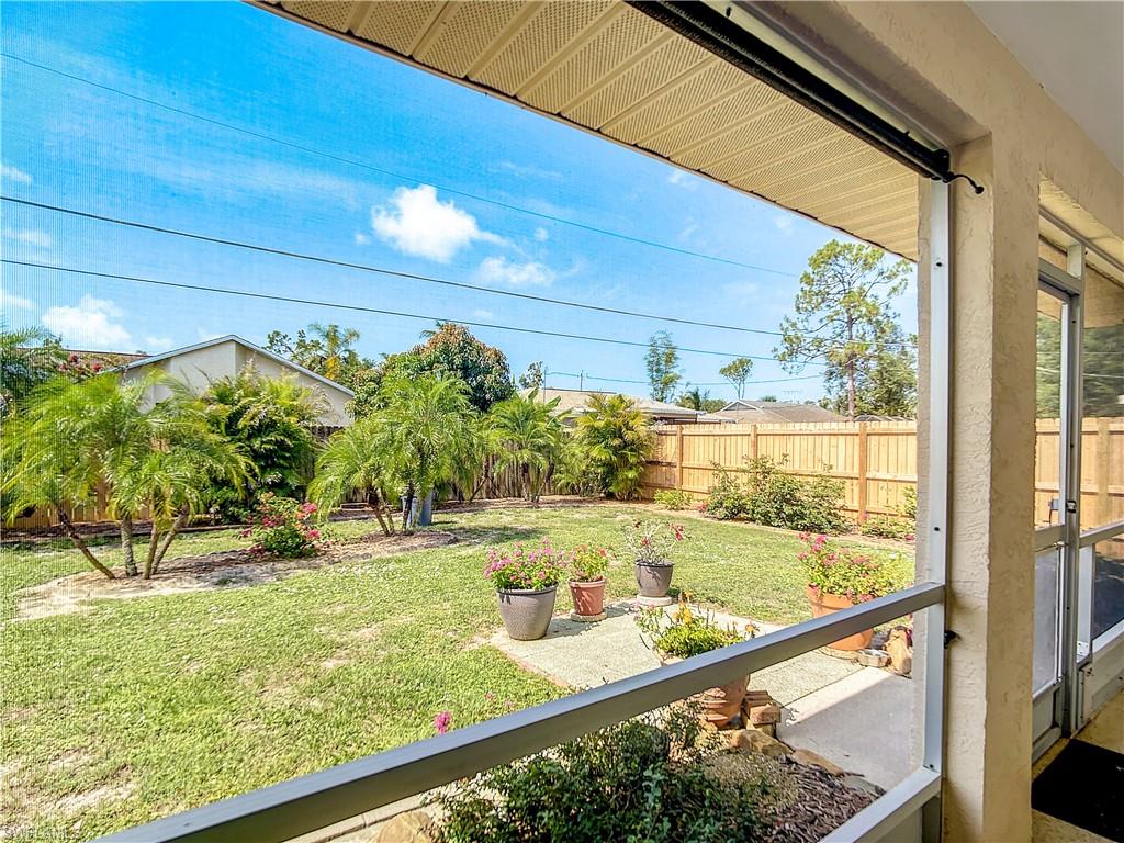 9072 Hamlin Road West Fort Myers, FL 33967 - Photo 35 of 50 a view of a porch and a yard