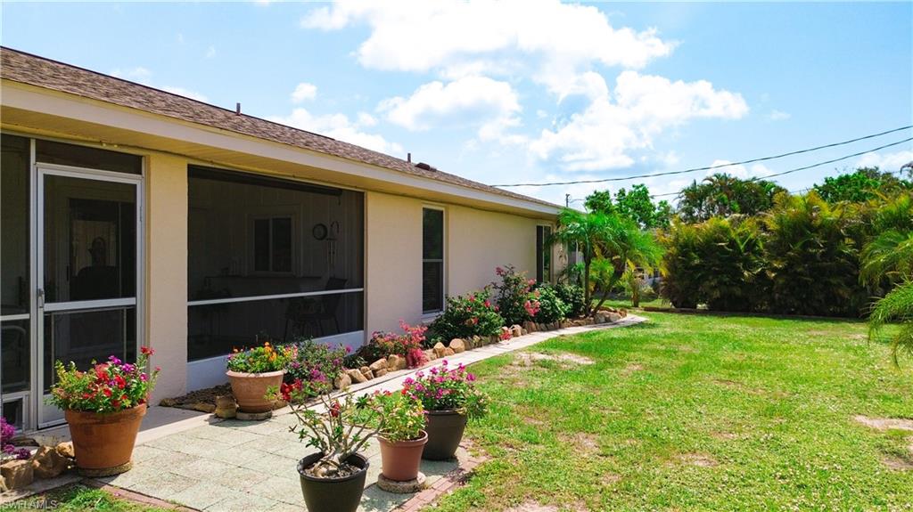 9072 Hamlin Road West Fort Myers, FL 33967 - Photo 37 of 50 a front view of a house having patio