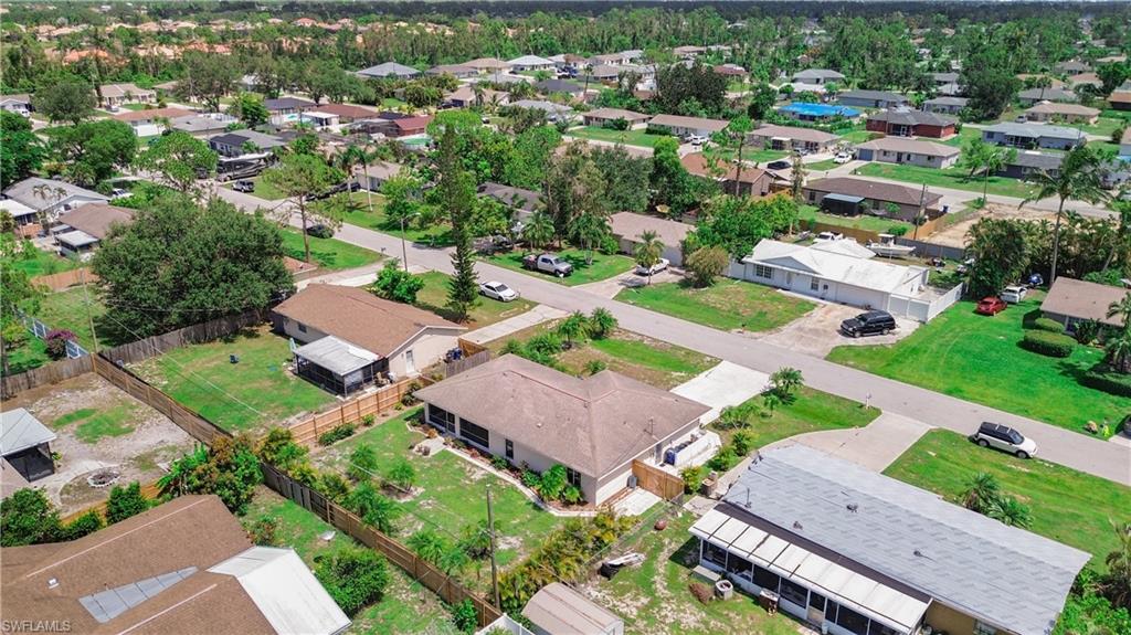 9072 Hamlin Road West Fort Myers, FL 33967 - Photo 41 of 50 an aerial view of residential houses with outdoor space