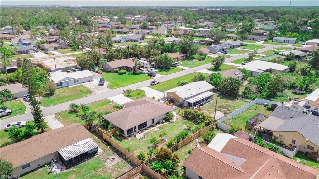 9072 Hamlin Road West Fort Myers, FL 33967 - Photo 45 of 50 an aerial view of residential houses with outdoor space
