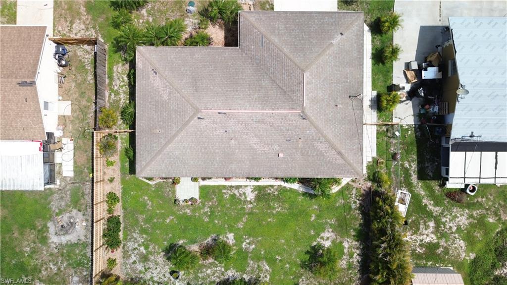 9072 Hamlin Road West Fort Myers, FL 33967 - Photo 50 of 50 an aerial view of residential house with outdoor space and trees