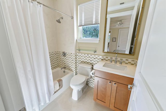 a kitchen with a cabinets and a stove top oven