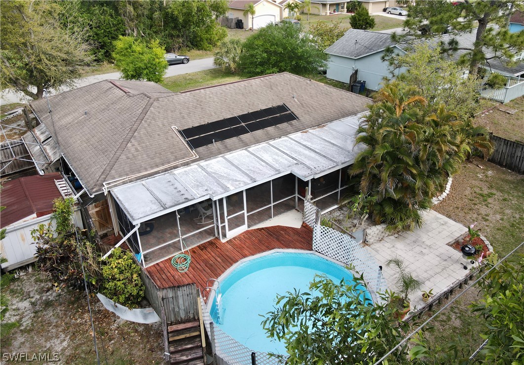 8036 Anhinga Road Fort Myers, FL 33967 - Photo 28 of 28 an aerial view of a house with swimming pool and patio
