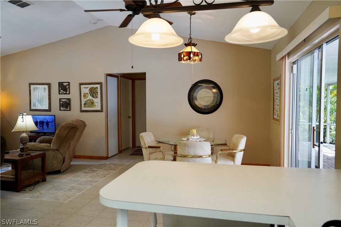 8036 Anhinga Road Fort Myers, FL 33967 - Photo 4 of 28 a living room with furniture and a window