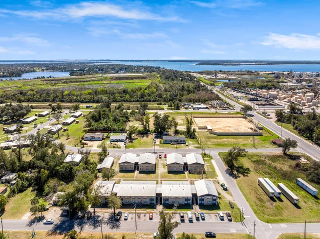 a view of a city with an ocean view