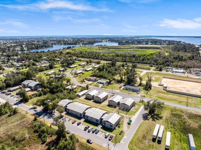 a view of a city with an ocean view