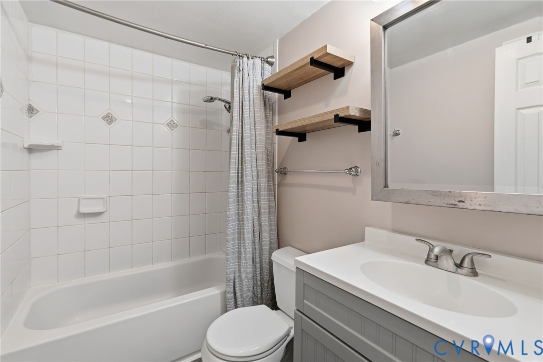 12145 White Bark Road Ruther Glen, VA 22546 - Photo 13 of 23 a bathroom with a sink toilet and shower